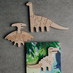 Wooden dinosaur puzzles on a gray background